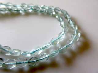 6-7mm Natural Aquamarine Faceted Oval Tumbles Beads 13 inches Strand GDS443