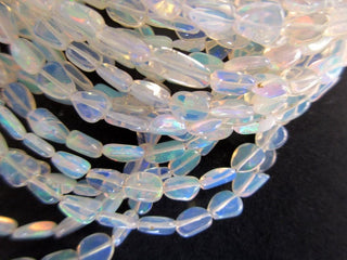 5mm To 8mm Natural White Ethiopian Welo Opal Smooth Oval Tumbles Beads Welo Opal Tumbles 18 Inch Strand GDS1049/3 - 18