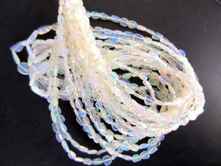 5mm To 8mm Natural White Ethiopian Welo Opal Smooth Oval Tumbles Beads Welo Opal Tumbles 18 Inch Strand GDS1049/3