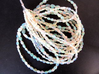 5mm To 8mm Natural White Ethiopian Welo Opal Smooth Oval Tumbles Beads Welo Opal Tumbles 18 Inch Strand GDS1049/3