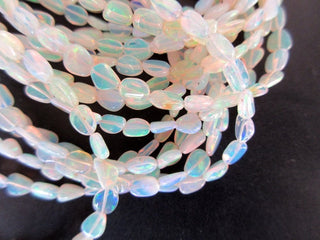 5mm To 8mm Natural White Ethiopian Welo Opal Smooth Oval Tumbles Beads Welo Opal Tumbles 18 Inch Strand GDS1049/3